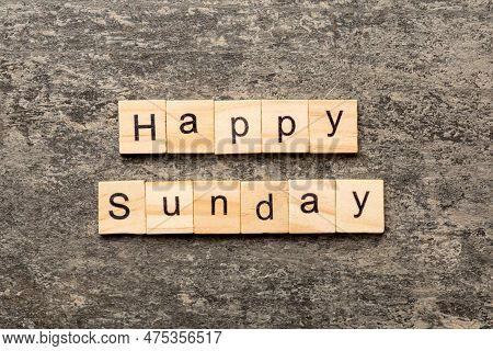 Hello Sunday Word Written On Wood Block. Hello Sunday Text On Cement Table For Your Desing, Concept.