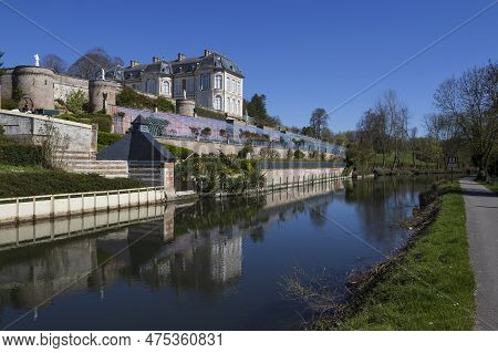 Long, France, 4 April 2023: The Beautiful 18th Century Chateau Long And The River Somme In The Somme