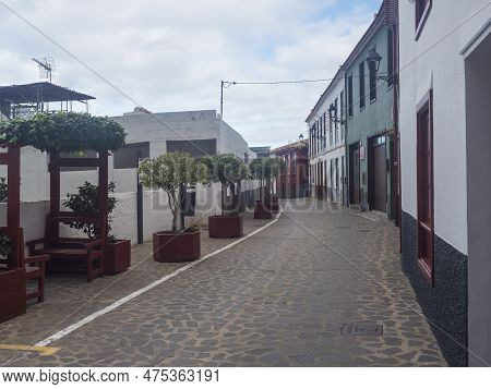 Agulo, La Gomera, Canary Islands, Spain, December 27, 2021: Cobbled Street With Colorful Traditional