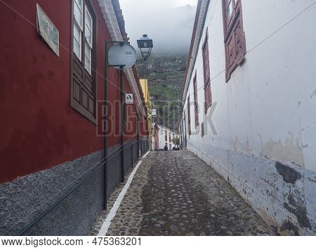Agulo, La Gomera, Canary Islands, Spain, December 27, 2021: Cobbled Street With Colorful Traditional