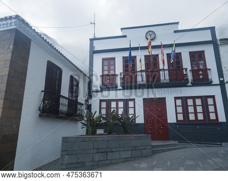 Square With Town Hall And Church Iglesia De San Marcos Evangelista In Traditional Style. Village Of 