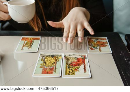 Tver, Russia - February 11, 2023. Tarot Cards, Tarot Card Divination, Esoteric Background. A Woman M