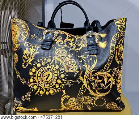 Latvia, Riga, April, 2023 - Versace Jeans Couture Handbag With Golden Design In Stockmann Shopping M