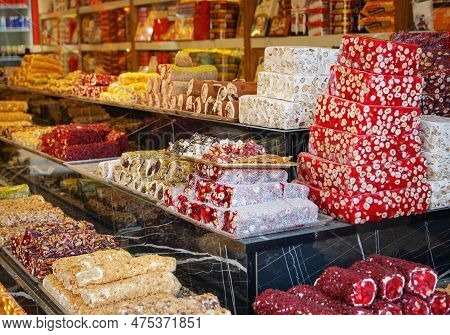 Oriental Sweets In Assortment At A Bazaar In Turkey. Traditional Turkish Sweets, Lokum, Baklava, Tur