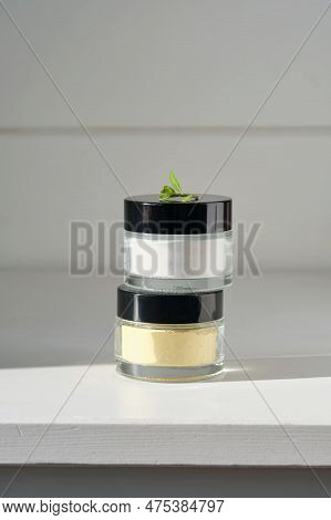Two Closed Jars Of Enzime Face Scrub.