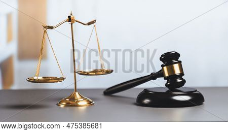 Shiny Golden Balanced Scale And Wooden Gavel In Court Library Background As Symbol Of Justice And Le