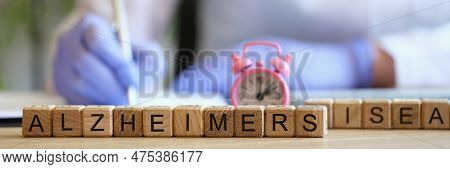 Close-up Of Alzheimer Word Collected With Wooden Blocks In Row. Alzheimers Disease, Progressive Neur