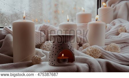 Aroma Lamp With Essential Oil, Aromatherapy At Home, Burning Candle, Dropping Essential Oil. Concept