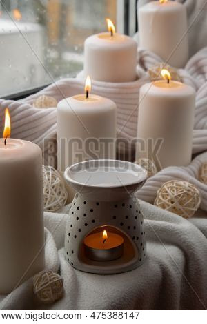 Aroma Lamp With Essential Oil, Aromatherapy At Home, Burning Candle, Dropping Essential Oil. Concept
