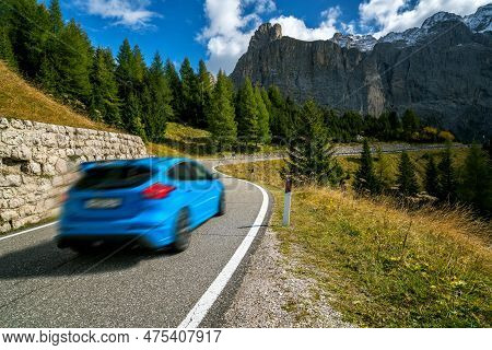 Car Driving On Beautiful Mountain Road With Trees, Forest And Mountains In The Backgrounds. Taken At