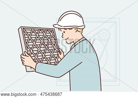 Man Holding Air Conditioner Replacement Filter Doing Preventive Maintenance Or Repairing Hvac Equipm