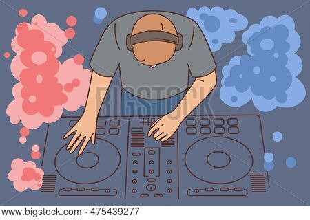Nightclub Dj Uses Mixing Console To Play Music From Vinyl Records To Party Goers. Dj Guy With Musica