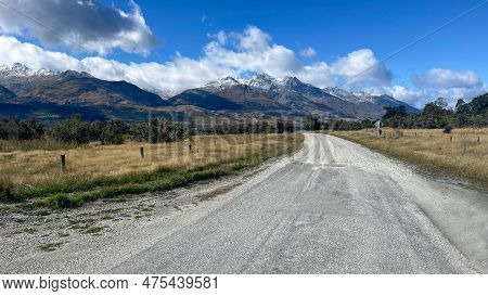 A Rural Gravel Narrow Road Alongside The Mountain Range Heading To Kinloch A Small Village On The Sh