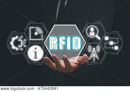 Rfid, Radio Frequency Identification Concept, Businessman Hand Holding Radio Frequency Identificatio