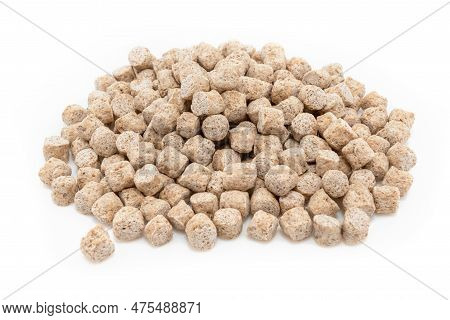 Oat Bran Extruded On A White Background. Bunch Of Bran. Healthy Eating