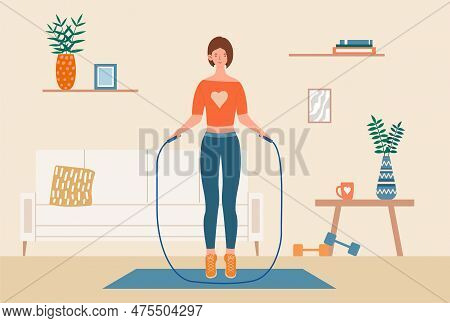 Woman Jumps Skipping Rope. Young Girl Goes In For Sports In Apartment, Does Cardio Workout. Active L