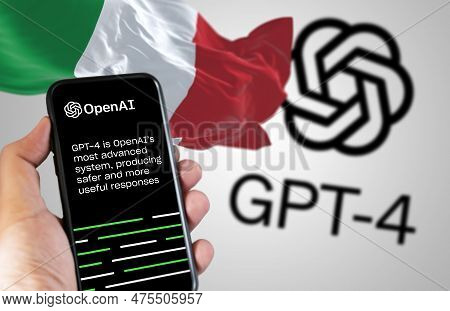 Rome, It, April 2023: Hand Holding A Phone With The Openai Gpt-4 Website On The Screen And Italian F