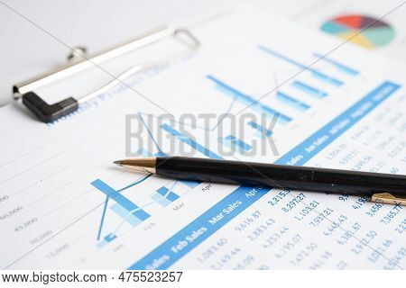 Pen On Chart Or Graph Paper. Financial, Account, Statistics And Business Data Concept.