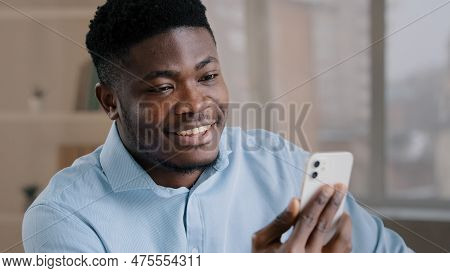 Happy Young African American Guy Businessman Handsome Entrepreneur Man Worker Hold Smartphone Talk B