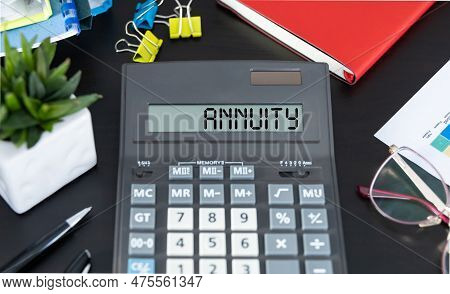 Calculator With The Word Annuity On Display On An Office Worplace