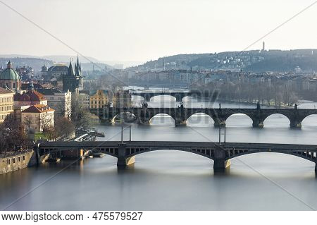Prague, Czech - March 14, 2016: Cityscape Of Prague With Lvtana River And Charles Bridge. Daytime Lo