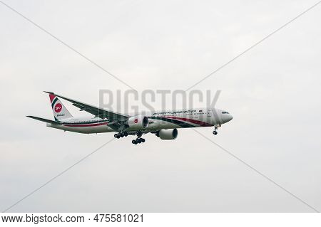 London, England - August 22, 2016: Biman Bangladesh Airlines Boeing 777 S2-afp Landing In London Hea