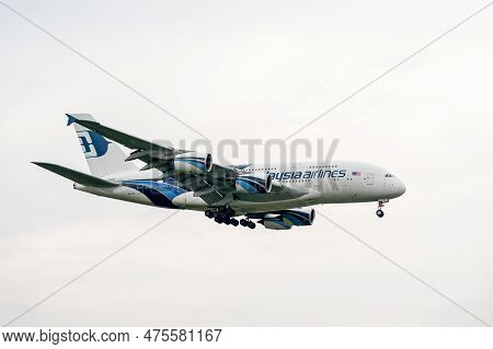 London, England - August 22, 2016: Malaysia Airlines Airbus A380 9m-mne Landing In London Heathrow I