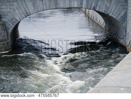 A View Of A Old Bridge Over River