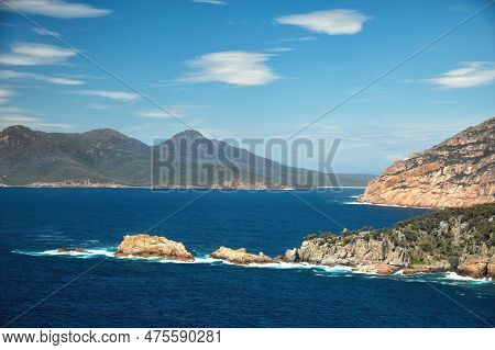 Beautiful View Of The Ocean And The Cliff Of Carp Bay From Cape Tourville Lighthouse At Freycinet Na