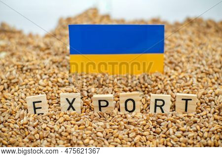 Ukraine's Grain Exports Are Questionable. The Word Exports And The Flag Of Ukraine On The Background
