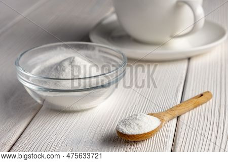 Herbal Sweetener Stevia In Spoon And A Cup Of Coffee