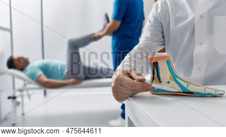 Flat Feet, Pes Planus. Podiatrist Doctor Diagnose Flatfoot During Medical Examination Of Patients Fe