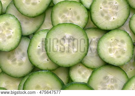 Cumber Slices Texture Background.  Healthy And Dietary Food Concept.