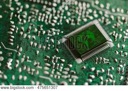 Environment Green Technology Computer Chip. Green World Icon On Circuit Board Technology Innovations