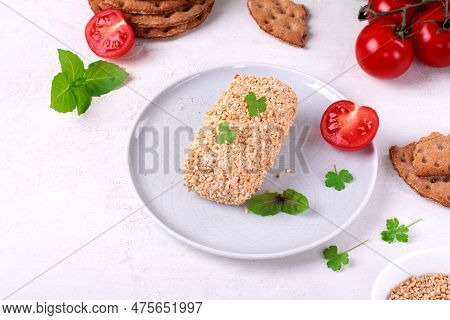Caboc, Scottish Soft Cheese Made Of Fat Milk, In Oat Grains Served On The Plate
