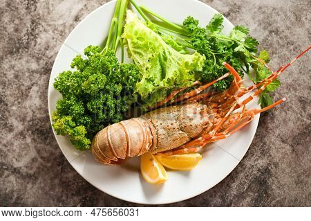 Spiny Lobster Food On Plate, Fresh Lobster Or Rock Lobster Seafood With Herb And Spices Lemon Corian