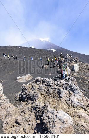 Mount Etna, Sicily, Italy - April 27, 2023: Tourists On Torre Del Filosofo, Famous View Point On The