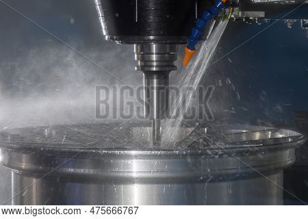 The  Cnc Milling Machine Cutting The Magnesium Alloy Wheel Part With Ball End Mill Tool. The Nylon A
