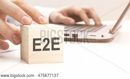 E2E Text Wooden Block On White Table Background. Idea, Strategy, Advertising, Marketing, Keyword And