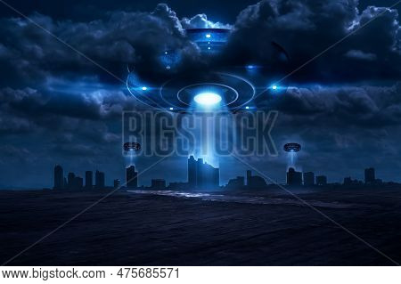 3d Rendering The Ufo Shooting A Beam Of Light Invaded The City At Night Fantasy.