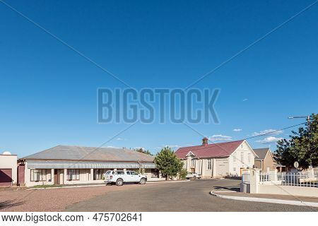 Prieska, South Africa - Feb 28 2023: A Street Scene, With A Townhouse And The Hall Of The Dutch Refo