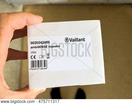 London, United Kingdom - Jan 1, 2022: Close-up Male Hand Holding New Pckage With Socket Plug Vaillan