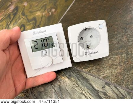 London, United Kingdom - Jan 1, 2022: A Close-up Of A Male Hand Unboxing The New Vaillant Ambisense 