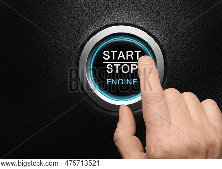 Finger About To Press Engine Start Button With Blue Glowing Ring In A Modern Car
