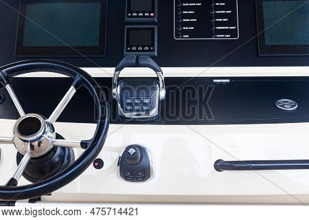 Luxury Yacht Control Panel With Steering Wheel, Gear Levers, Navigation Devices, Control Buttons And