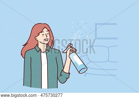Woman Uses Air Freshener To Get Rid Of Unpleasant Smell In Apartment After Cleaning. Housewife Girl 