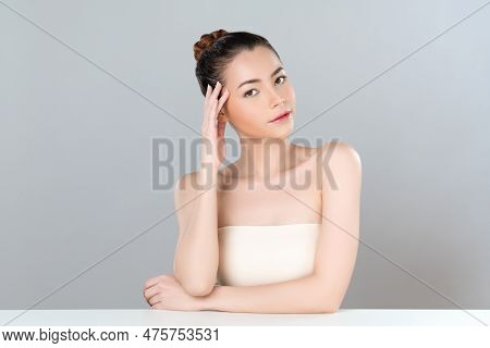 Glamorous Woman Portrait With Perfect Smooth Pure Clean Skin With Soft Cosmetic Makeup In Isolated B