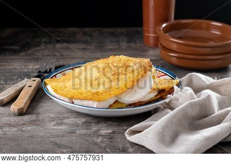 Traditional Venezuelan Beef Cachapa On Wooden Table