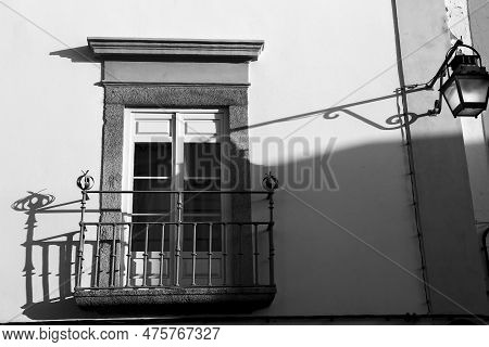 Old House With White Chipped Facade In Evora Town, Portugal