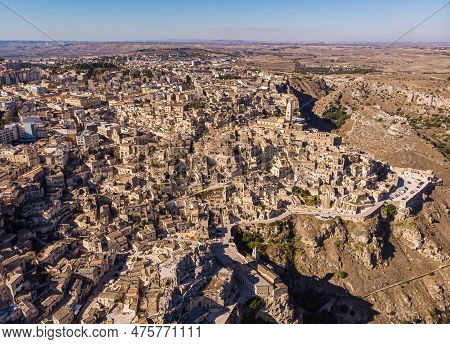 View From Above, Stunning Aerial View Of The Matera S Skyline During A Beautiful Sunrise. Matera Is